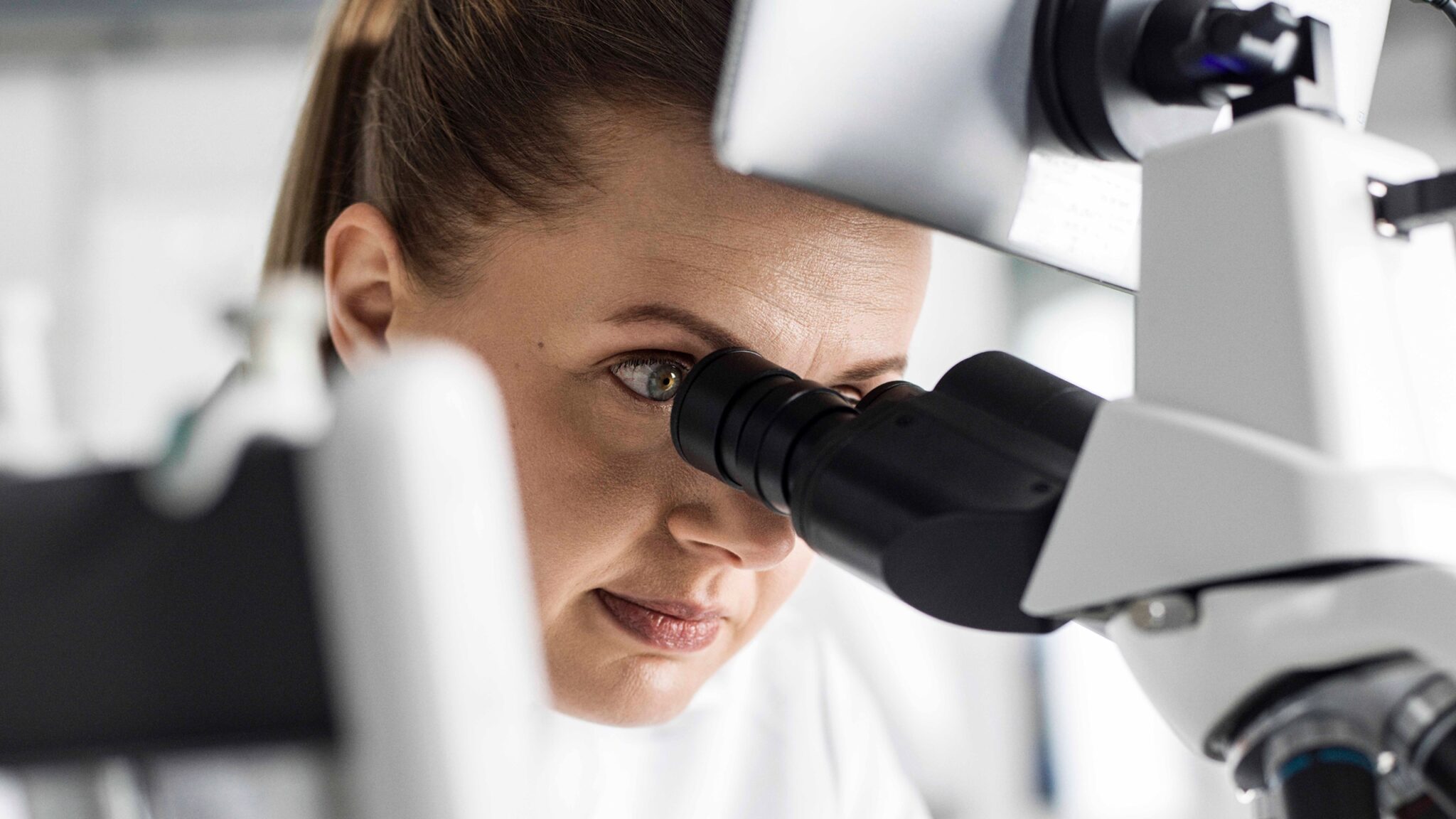 Solein - Looking through a microscope